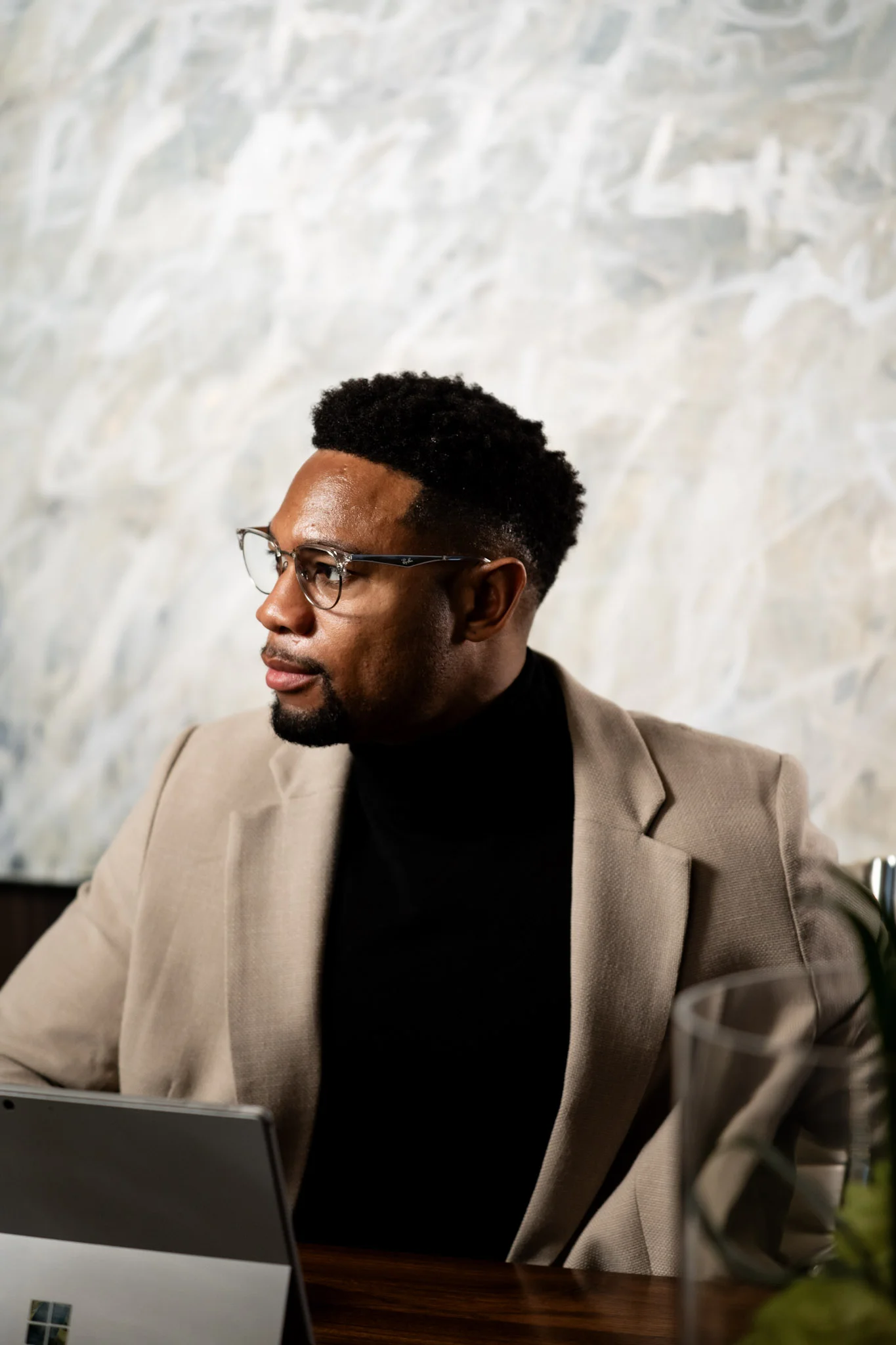 William Johnson reviewing athlete data